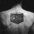 3D style black ink upper back tattoo of mysterious cube