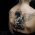 3D style breathtaking looking back tattoo of sad female angel