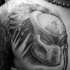 3D style very detailed chest tattoo of detailed Predators helmet
