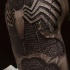 3D style very detailed shoulder tattoo of spider man suit