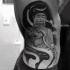 3D style very detailed side tattoo of large Buddha statue