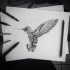 Amazing patterned hummingbird tattoo design