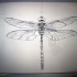 Attractive outline dragonfly tattoo design