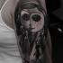 Awesome Coraline movie tattoo on shoulder