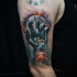 Awesome abstract hand with eye tattoo on shoulder