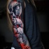 Awesome astronaut woman tattoo on arm