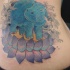 eccezionale blu ippopotamo e viola fiore loto tatuaggio su costolette
