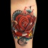 Awesome circus theme rose tattoo