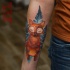 Awesome cortoon fox tattoo on forearm