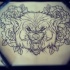 Awesome gnarling wolf head suroounded with roses tattoo design