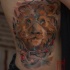 Awesome lion tattoo on side