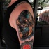 Awesome metal skull tattoo on shoulder