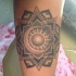 Tatuaje  de mandala con luna y sol, idea buena