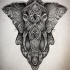 Black-and-white decorated elephant tattoo design