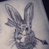 Black-and-white hare head killed with arrow tattoo design