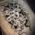 Black-and-white rich-decorated medusa gorgona tattoo design