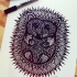Black-ink hedgehog with ornate spines tattoo design