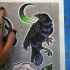 Black old school raven and green moon tattoo design