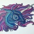 Blue-and-purple geometric-patterned unicorn head tattoo design