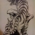 Brave black-and-white tiger standing on stones pile tattoo design