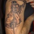 Tatuaje en el brazo,
samurái sabio con dos espadas