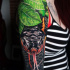 Bright snake tattoo on shoulder
