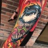 Bright venom tattoo on arm