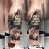 Tatuaje de estilo de dibujos animados en la pierna
