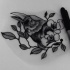 Charming black-and-white raven head and flowers tattoo design