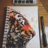 Chic watercolor tiger portrait in profile tattoo design