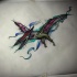 Colored flying dinosaur tattoo design