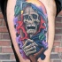 Colorful grim reaper tattoo on leg