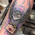 Colorfull owl and letter tattoo