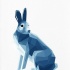 Cool blue-color geometric-style sitting hare tattoo design