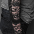 Cool buddah tattoo on forearm