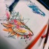 Cool orange half-geometric watercolor whale tattoo design
