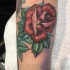 Cool rose tattoo on arm