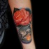 Cool rose tattoo on forearm