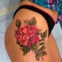 fresco fiore peonia rosa tatuaggio su fianco