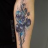 Cute flower tattoo on arm