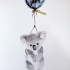 Cute fluffy wild animal flying by galaxy balloon tattoo design