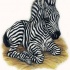 Cute resting zebra baby tattoo design