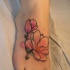 carino fiore magnolia rosa tatuaggio su piede