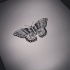 Cute small black-and-white butterfly tattoo design