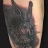 Tatuaje  de liebre negro oscuro