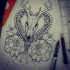 Deer skull in heart frame with roses tattoo design