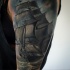 Detailed ship tattoo on shoulder