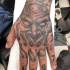 Devil tattoo on hand