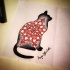 Dotwork cat silhouette with red mandala pattern tattoo design