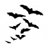 Elegant black flying bat flock tattoo design